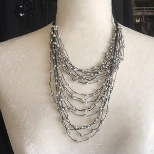 Pearl in string necklace